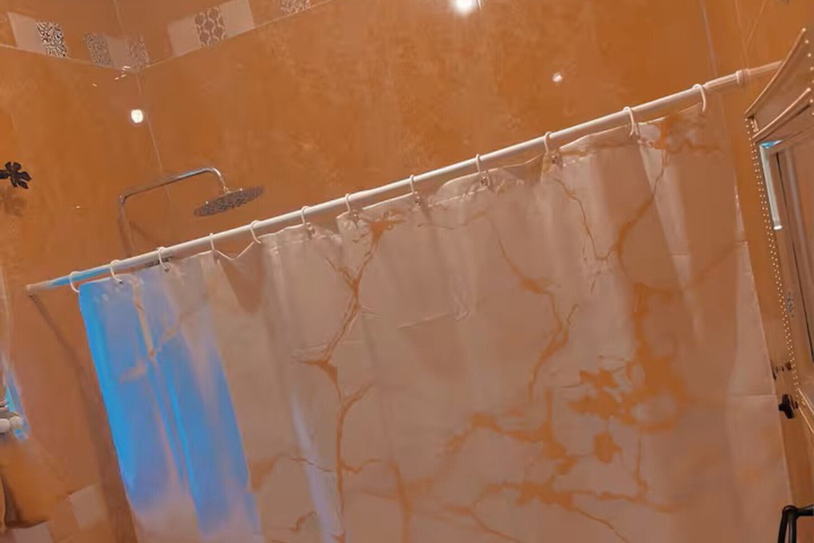 Color-themed master suite with king bed, luxury linens, and private balcony ocean access.