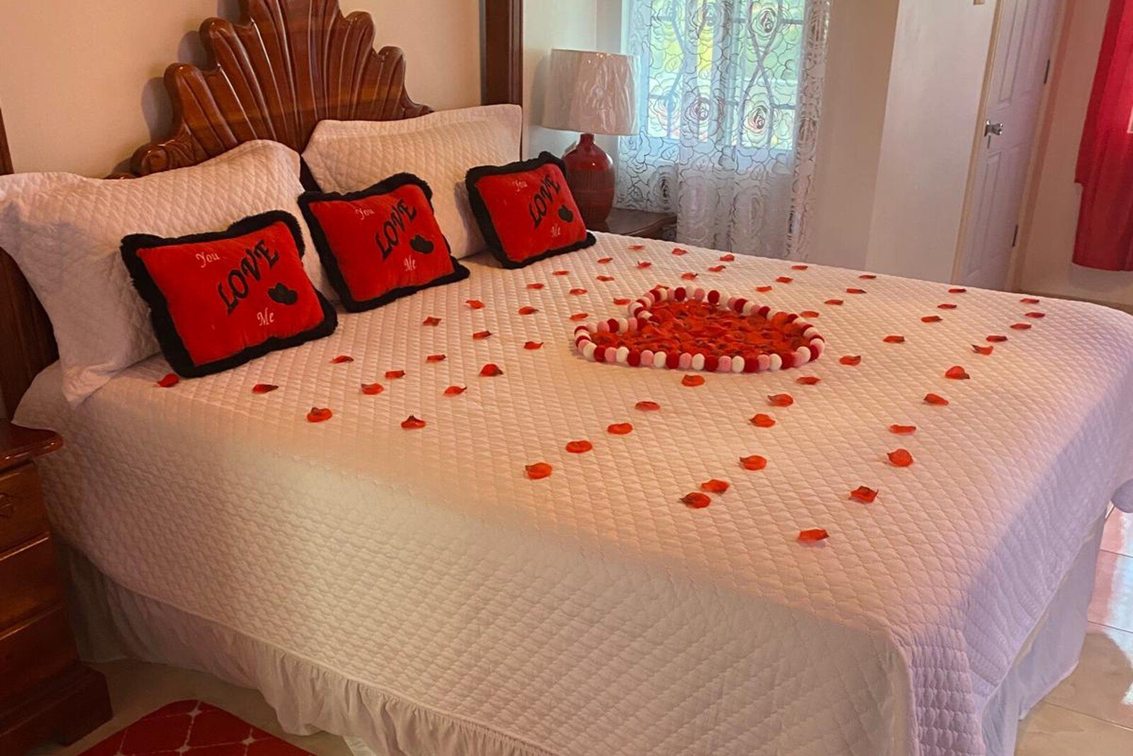 The blue-themed suite at BayPalace, showcasing elegant decor and a plush king bed.